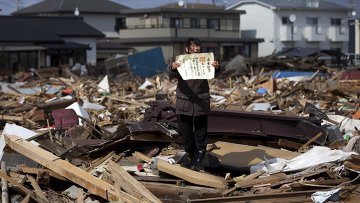 Первый приз в номинации «People in the News Stories» японского фотографа Ясуоши Чиба Первый приз в номинации "People in the News Stories" японского фотографа Ясуоши Чиба