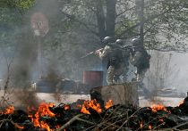Украинские военные у блокпоста на подъезде к Славянску Украинские военные у блокпоста на подъезде к Славянску
