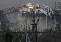 Главный терминал аэропорта Донецка, разрушенный во время боев между ополченцами и украинской армией Главный терминал аэропорта Донецка, разрушенный во время боев между ополченцами и украинской армией