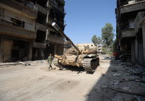 Боевая техника 4-й дивизии Сирийской Арабской Армии на передовой позиции в пригороде Дамаска Дарайе Боевая техника 4-й дивизии Сирийской Арабской Армии на передовой позиции в пригороде Дамаска Дарайе