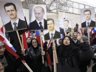 Портреты Владимира Путина и Башара Асада на акции в Дамаске Портреты Владимира Путина и Башара Асада на акции в Дамаске
