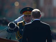 Президент России Владимир Путин и министр обороны РФ Сергей Шойгу на военном параде Президент России Владимир Путин и министр обороны РФ Сергей Шойгу на военном параде
