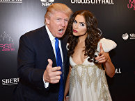 Американский миллиардер Дональд Трамп и «Мисс Вселенная – 2012» Оливия Калпо Американский миллиардер Дональд Трамп и «Мисс Вселенная – 2012» Оливия Калпо