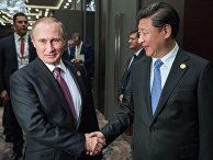 Президент России Владимир Путин и председатель Китайской Народной Республики (КНР) Си Цзиньпин во время встречи на полях саммита "Группы двадцати" (G20) Президент России Владимир Путин и председатель Китайской Народной Республики (КНР) Си Цзиньпин во время встречи на полях саммита "Группы двадцати" (G20)