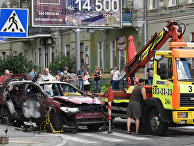 Взорванный автомобиль на перекрестке улиц Богдана Хмельницкого и Ивана Франко, в котором погиб журналист Павел Шеремет Взорванный автомобиль на перекрестке улиц Богдана Хмельницкого и Ивана Франко, в котором погиб журналист Павел Шеремет