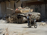 Боевая техника 4-й дивизии Сирийской Арабской Армии на передовой позиции в пригороде Дамаска Дарайе
