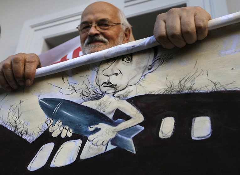 Акция протеста в Минске против российского вмешательства в Сирии