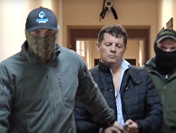 Стоп-кадр с оперативного видео задержания украинца Роман Сущенко Стоп-кадр с оперативного видео задержания украинца Роман Сущенко