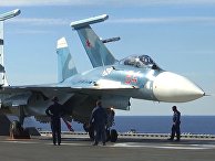 Истребитель Су-33 на палубе тяжёлого авианесущего крейсера «Адмирал Флота Советского Союза Кузнецов» у берегов Сирии в Средиземном море Истребитель Су-33 на палубе тяжёлого авианесущего крейсера «Адмирал Флота Советского Союза Кузнецов» у берегов Сирии в Средиземном море