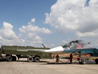 Заправка российского истребителя-бомбардировщика Су-34 на авиабазе "Хмеймим" в Сирии Заправка российского истребителя-бомбардировщика Су-34 на авиабазе "Хмеймим" в Сирии