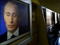 Изображение Владимира Путина на экране компьютера в интернет-кафе Изображение Владимира Путина на экране компьютера в интернет-кафе