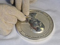Изготовление коллекционной медальной монеты с изображением президента РФ Владимира Путина Изготовление коллекционной медальной монеты с изображением президента РФ Владимира Путина
