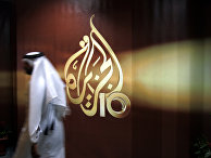 Сотрудник в офисе телекомпании Al Jazeera в Дохе, Катар