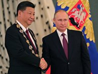 Президент РФ Владимир Путин и председатель Китайской Народной Республики Си Цзиньпин во время встречи. 4 июля 2017 Президент РФ Владимир Путин и председатель Китайской Народной Республики Си Цзиньпин во время встречи. 4 июля 2017