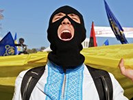 Участник марша по случаю годовщины образования Украинской повстанческой армии в Киеве Участник марша по случаю годовщины образования Украинской повстанческой армии в Киеве