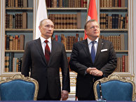 Премьер-министр России Владимир Путин и премьер-министр Дании Ларс Лёкке Расмуссен во всемя переговоров в Копенгагене Премьер-министр России Владимир Путин и премьер-министр Дании Ларс Лёкке Расмуссен во всемя переговоров в Копенгагене