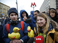 Участники оппозиционного митинга в Москве Участники оппозиционного митинга в Москве