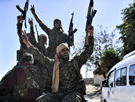 Боевики «сирийских демократических сил» в Ракке, Сирия Боевики «сирийских демократических сил» в Ракке, Сирия