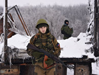 Пророссийские ополченцы на дороге, ведущей к аэропорту Донецка Пророссийские ополченцы на дороге, ведущей к аэропорту Донецка