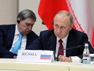 Владимир Путин во время встречи с президентом Ирана Хасаном Рухани и президентом Турции Реджепом Тайипом Эрдоганом. 22 ноября 2017
