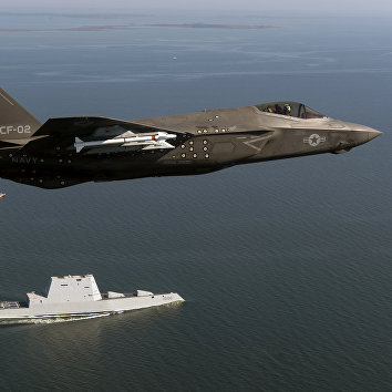 Истребитель F-35 и эсминец Зумвальт Истребитель F-35 и эсминец Зумвальт