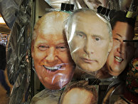 Маски с изображениями Дональда Трампа, Владимира Путина и Ким Чен Ына Маски с изображениями Дональда Трампа, Владимира Путина и Ким Чен Ына