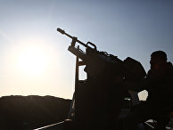 Турецкие боевики из Свободной сирийской армии занимают позицию в районе Тал Малид, к северу от Алеппо. 20 января 2018