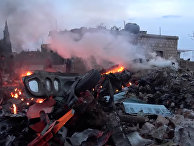 Обломки сбитого боевиками российского самолета Су-25 близ Идлиба в Сирии. Фото из социальных сетей Обломки сбитого боевиками российского самолета Су-25 близ Идлиба в Сирии. Фото из социальных сетей
