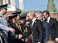 Владимир Путин и Биньямин Нетаньяху во время военного парада в ознаменование 73-й годовщины Победы в Великой Отечественной войне 1941–1945 годов на Красной площади в Москве. 9 мая 2018 Владимир Путин и Биньямин Нетаньяху во время военного парада в ознаменование 73-й годовщины Победы в Великой Отечественной войне 1941–1945 годов на Красной площади в Москве. 9 мая 2018