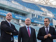 Президент РФ Владимир Путин, президент FIFA Джанни Инфантино и губернатор Краснодарского края Вениамин Кондратьев во время осмотра после реконструкции стадиона "Фишт". 3 мая 2018 Президент РФ Владимир Путин, президент FIFA Джанни Инфантино и губернатор Краснодарского края Вениамин Кондратьев во время осмотра после реконструкции стадиона "Фишт". 3 мая 2018