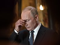 Президент РФ Владимир Путин во время благодарственного молебна по случаю инаугурации в Благовещенском соборе Кремля Президент РФ Владимир Путин во время благодарственного молебна по случаю инаугурации в Благовещенском соборе Кремля