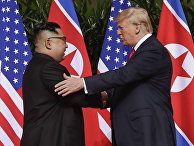 Президент США Дональд Трамп и председатель КНДР Ким Чен Ын во время встречи в Сингапуре Президент США Дональд Трамп и председатель КНДР Ким Чен Ын во время встречи в Сингапуре