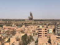 Вид на район Джафра в Дейр-эз-Зоре, где продолжаются бои между сирийской армией и боевиками запрещенной в России организации ИГИЛ. 23 сентября 2017