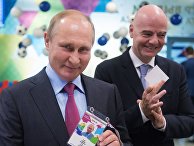 Президент РФ Владимир Путин и президент FIFA Джанни Инфантино получили паспорта болельщика Президент РФ Владимир Путин и президент FIFA Джанни Инфантино получили паспорта болельщика