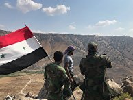 Сирийские военные в деревне Эль-Кувейа на границе с Иорданией и Израилем на юго-западе провинции Дераа Сирийские военные в деревне Эль-Кувейа на границе с Иорданией и Израилем на юго-западе провинции Дераа