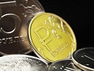 Монета номиналом один рубль с символикой Российского рубля Монета номиналом один рубль с символикой Российского рубля