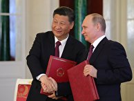 Владимир Путин и председатель Китайской Народной Республики Си Цзиньпин во время церемонии подписания документов по итогам встречи. 4 июля 2017 Владимир Путин и председатель Китайской Народной Республики Си Цзиньпин во время церемонии подписания документов по итогам встречи. 4 июля 2017