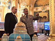 Президент РФ Владимир Путин и министр обороны РФ Сергей Шойгу на презентации военного инновационного технополиса "Эра". 23 февраля 2018