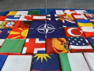 Флаги саммита стран-участниц НАТО в Брюсселе. 11 июля 2018