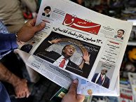 Газета с фотографией президента США Дональда Трампа на первой полосе в Тегеране Газета с фотографией президента США Дональда Трампа на первой полосе в Тегеране