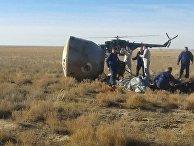 Капсула с космонавтом Алексеем Овчининым и астронавтом NASA Ником Хейгом после аварийной посадки Капсула с космонавтом Алексеем Овчининым и астронавтом NASA Ником Хейгом после аварийной посадки