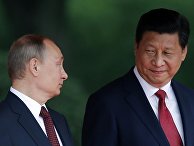 Владимир Путин с председателем КНР Си Цзиньпинем во время своего визита в Китай Владимир Путин с председателем КНР Си Цзиньпинем во время своего визита в Китай