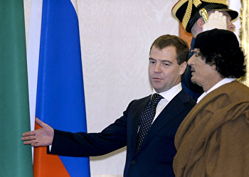 Президент России Дмитрий Медведев и лидер Социалистической Народной Ливийской Арабской Джамахирии Муамар Каддафи Встреча Дмитрия Медведева и Муамара Каддафи