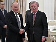 Владимир Путин и советник президента США по вопросам национальной безопасности Джон Болтон во время встречи. 23 октября 2018