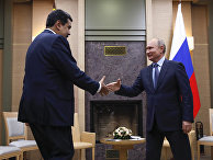 Президент РФ Владимир Путин и президент Венесуэлы Николас Мадуро во время встречи Президент РФ Владимир Путин и президент Венесуэлы Николас Мадуро во время встречи