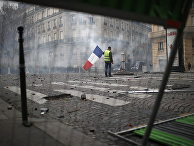 Участники акции протеста в Париже Участники акции протеста в Париже