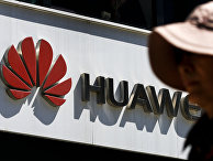 Логотип магазина Huawei в Пекине, Китай Логотип магазина Huawei в Пекине, Китай