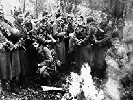 Бойцы «Голубой дивизии» у костра на Московском фронте 15 декабря 1941 года Бойцы «Голубой дивизии» у костра на Московском фронте 15 декабря 1941 года