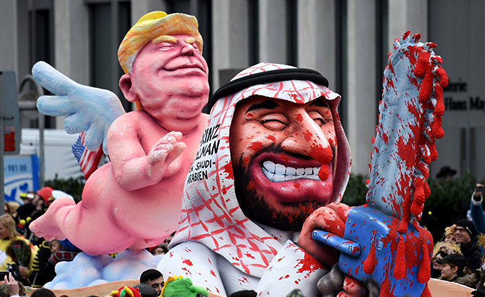 Фигуры, изображающие Президента США Дональда Трампа и наследного принца Саудовской Аравии Мохаммада бен Салмана на карнавале в Дюссельдорфе Фигуры, изображающие Президента США Дональда Трампа и наследного принца Саудовской Аравии Мохаммада бен Салмана на карнавале в Дюссельдорфе