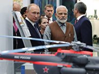 Президент РФ Владимир Путин и премьер-министр Индии Нарендра Моди во время посещения выставки в рамках V Восточного экономического форума Президент РФ Владимир Путин и премьер-министр Индии Нарендра Моди во время посещения выставки в рамках V Восточного экономического форума